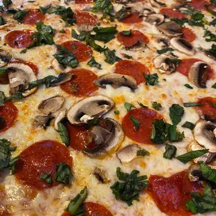 a pepperoni and mushroom pizza