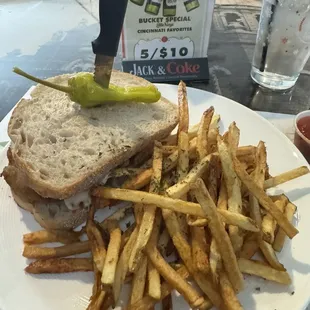 Breaded chicken cutlet sandwich and fries