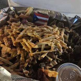 Tripleta Loaded Fries! Think of it as a deconstructed Tripleta sandwich with delicious thin matchstick fries!