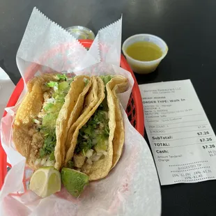 Dos tacos pescador with delicious green sauce