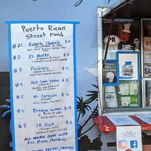 a food truck with menus
