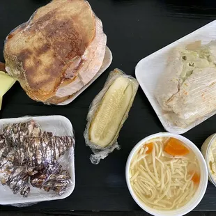 Aysel's Sandwich, Bennett's Wrap, Matzo Ball soup, potato salad, chocolate croissants, pickles, chips