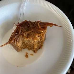 a piece of cake on a paper plate