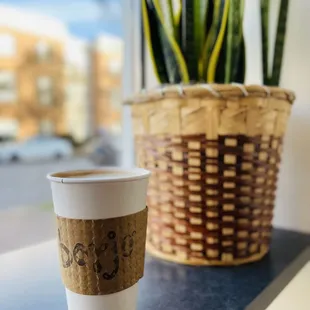 a cup of coffee on a table