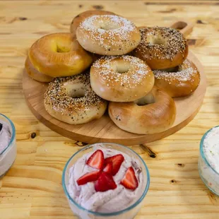 a variety of bagels and dips