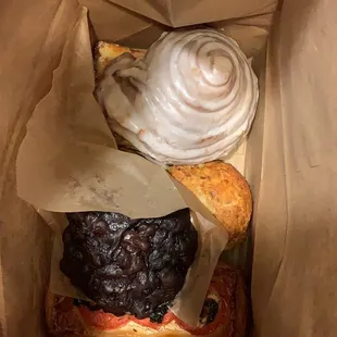 Flourless Chocolate Walnut Cookie and some savory pastries and i think the white frosted one is the morning Bun.