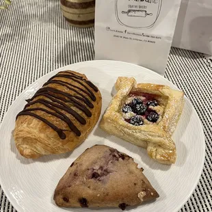 Chocolate croissant, blueberry cream puff, &amp; white chocolate raspberry scone