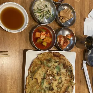 Seafood pancake and banchan.