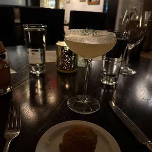 Lemon drop martini and arancini