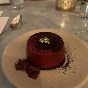 a red velvet dessert on a white plate