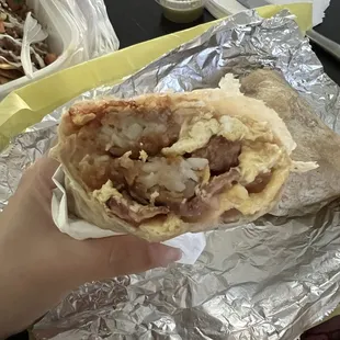 Bacon and egg breakfast burrito (has beans and hashbrowns)
