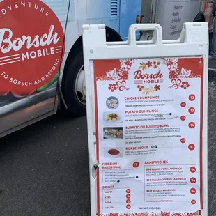 a menu on the side of a truck