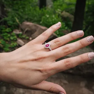 Stunning Borsheim's pear-shaped ruby engagement ring.