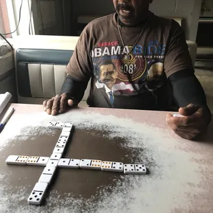 Playing dominoes with the Owner Bo Roach while I wait. Southern Hospitality at the best, Ribs, Wings, Cole Slaw are 10 out of 10....