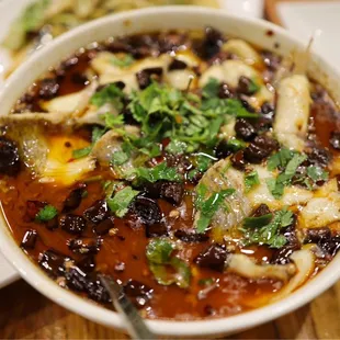 a bowl of soup on a table