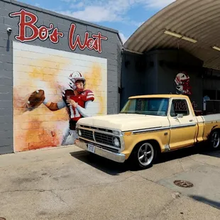 a truck parked in front of a building