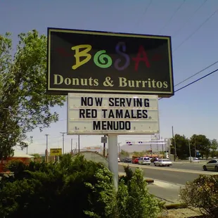 a sign for bosa donuts and burritos