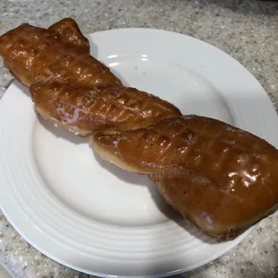 Glazed twist, which should be everyone&apos;s favorite donut. Try to eat it slowly. Doesn&apos;t work.