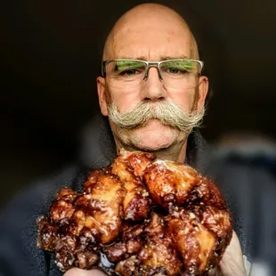 Lonny (aka @donutduster) with a delicious cherry fritter from Bosa Donuts.