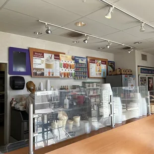 a counter with a variety of donuts