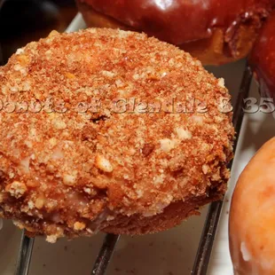 a variety of donuts on a rack