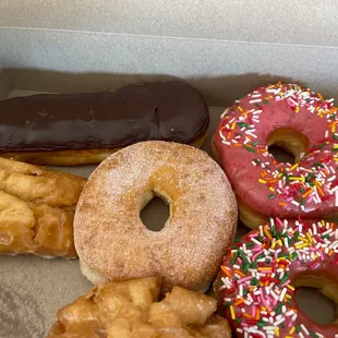 a variety of donuts in a box
