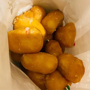 a close up of a bag of doughnuts