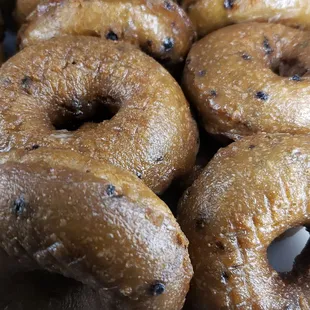 a close up of a pile of donuts