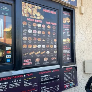 a menu on the outside of a restaurant