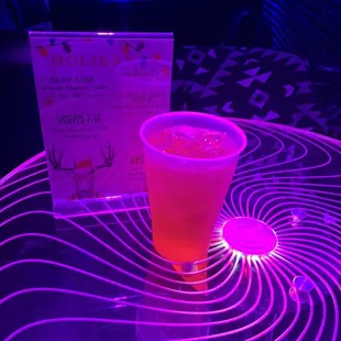 a drink in a plastic cup