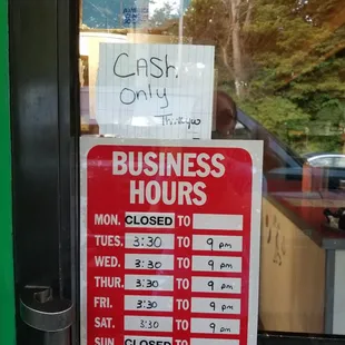 a business hours sign