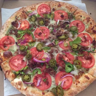 Always order at least one pizza with their pesto- it's amazing! As you can see, the ingredients are always fresh! Best in town!