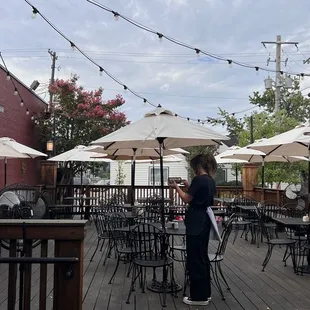 a woman standing on a deck