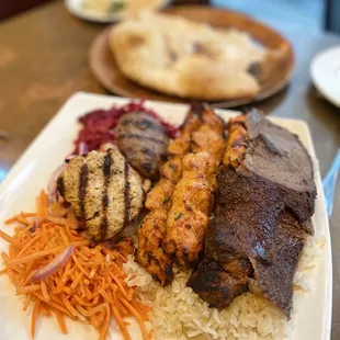 MIXED GRILL FOR TWO: Doner Kebap, Chicken &amp; Lamb Adana Kebap, Chicken &amp; Lamb Sis Kebap and Chicken &amp; Lamb Köfte.
