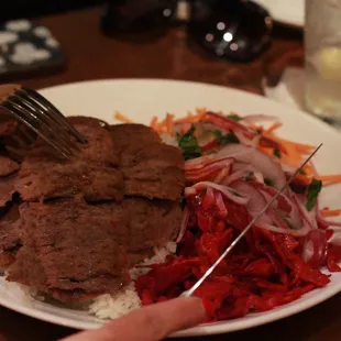 Delectable and tender Lamb Adana was paired nicely with rice, fresh vegetables, and pickled cabbage and beets.