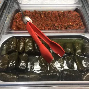 Dolmas (side dish) and some sauces for your sandwiches.