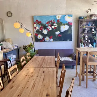a dining room with a table and chairs