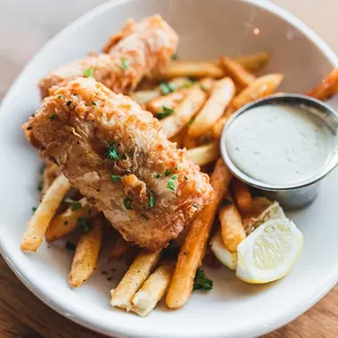 a plate of fried fish and fries