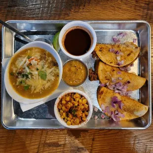 Birria tacos, corn, red chile consume &amp; green chile pork stew