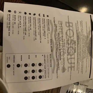 a menu and a bowl of soup