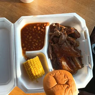 bbq with beans and corn on the cob