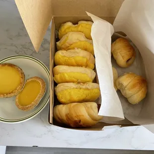 Egg custard tart, pineapple buns, cheesy hot dog bun, mini hot dog buns
