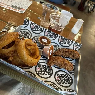 Four Piece Chicken Tender + 1 Side + 2 Sauces
