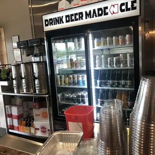 a drink bar with a beverage cooler