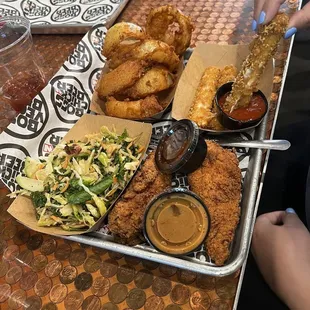 Chicken Fingers, ColeSlaw, Onion rings and Mozzarella sticks