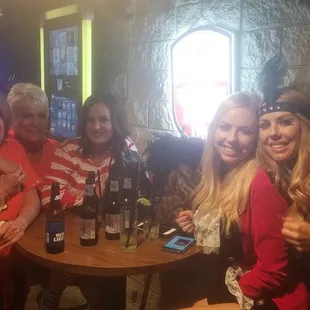 a group of women at a bar