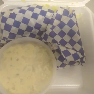 a meal in a styrofoam container