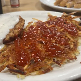 Chicken Fried Steak and 2 Large Eggs hash browns French toast