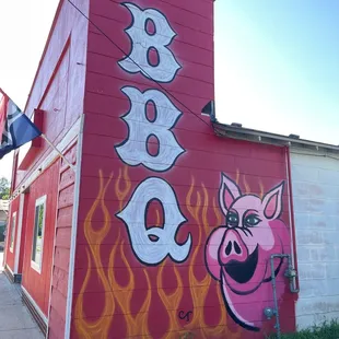 a pig on the side of a building