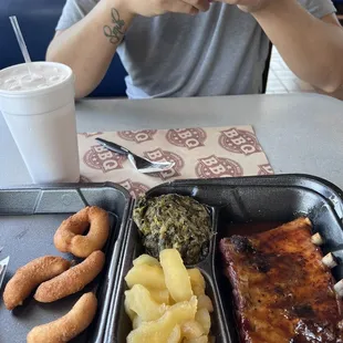 a man taking a picture of his meal